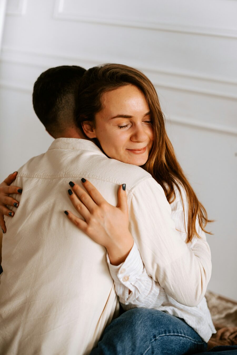Couple embracing during couples therapy session